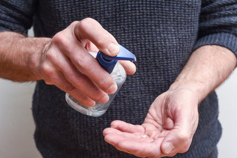 Hand sanitizer being applied to a hand