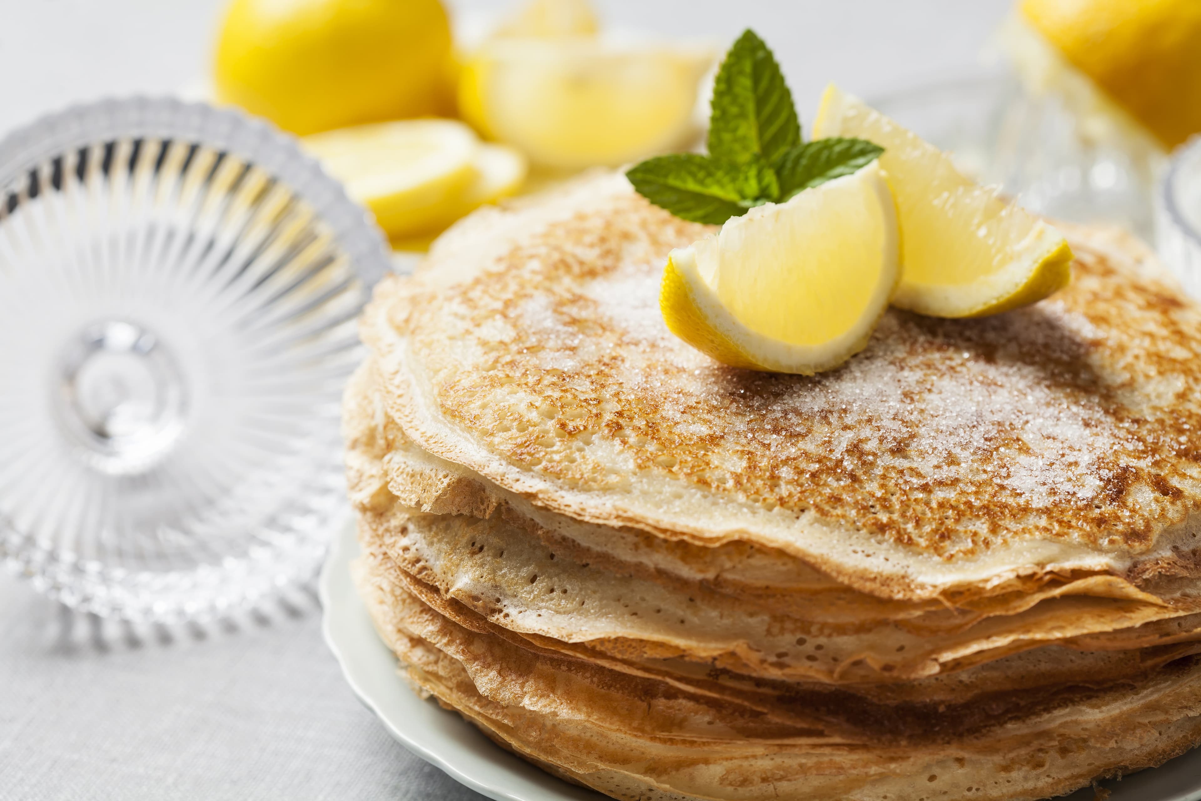 A stack of lemon pancakes with sweetner